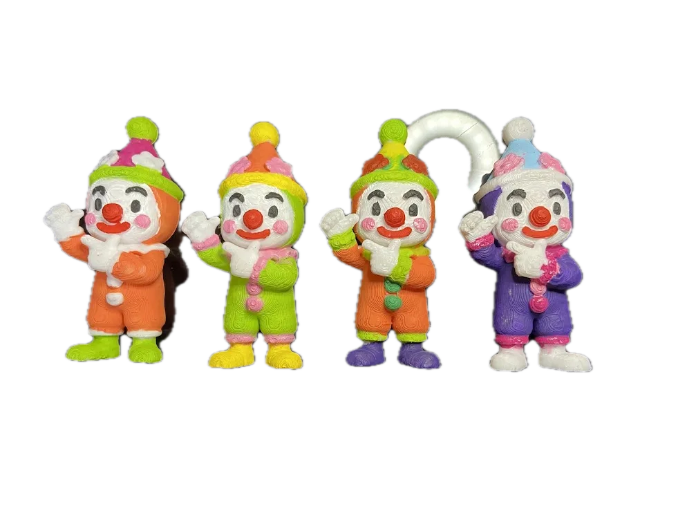 Las cuatro variantes de color del imán de Payaso sobre fondo blanco